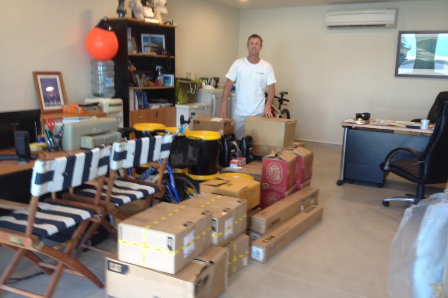 APS Phuket sorting parts for delivery in one of their Marina offices